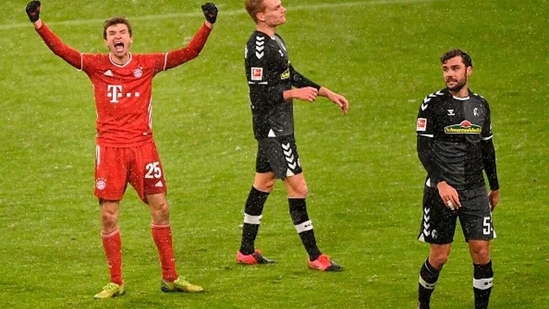 Bayern Munich's German forward Thomas Mueller celebrates after scoring. (Getty Images)