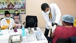 A medic administers the dose of Covishield vaccine to senior doctor of IGIMS hospital, in Patna on Monday. (ANI) A medic administers the dose of Covishield vaccine to senior doctor of IGIMS hospital, in Patna on Monday. (ANI)