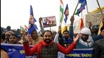 Supporters of farmers take part in a flag march along a blocked highway as farmers continue to protest against the central government's recent agricultural reforms at the Delhi-Uttar Pradesh state border in Ghazipur on January 17. (AFP) Supporters of farmers take part in a flag march along a blocked highway as farmers continue to protest against the central government's recent agricultural reforms at the Delhi-Uttar Pradesh state border in Ghazipur on January 17. (AFP)