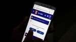 A healthcare worker enters data into the Co-WIN app. (REUTERS) A healthcare worker enters data into the Co-WIN app. (REUTERS)