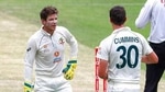 Australian captain Tim Paine, left, talks with bowler Pat Cummins during play on day three of the fourth cricket test between India and Australia at the Gabba, Brisbane, Australia, Sunday, Jan. 17, 2021. (AP Photo/Tertius Pickard)(AP) Australian captain Tim Paine, left, talks with bowler Pat Cummins during play on day three of the fourth cricket test between India and Australia at the Gabba, Brisbane, Australia, Sunday, Jan. 17, 2021. (AP Photo/Tertius Pickard)(AP)