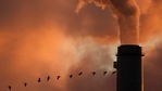 FILE - The Jan. 10, 2009 file photo shows a flock of geese flying past a smokestack at the Jeffery Energy Center coal power plant near Emmitt, Kan. A new study says the amount of global warming already baked into the air because of past carbon pollution is enough to blow past internationally agreed upon climate limits. A study on Monday, Jan. 4, 2021 takes a different look at what's called committed warming that comes from heat-trapping gases staying in the atmosphere for more than a century. (AP Photo/Charlie Riedel, File)(AP) FILE - The Jan. 10, 2009 file photo shows a flock of geese flying past a smokestack at the Jeffery Energy Center coal power plant near Emmitt, Kan. A new study says the amount of global warming already baked into the air because of past carbon pollution is enough to blow past internationally agreed upon climate limits. A study on Monday, Jan. 4, 2021 takes a different look at what's called committed warming that comes from heat-trapping gases staying in the atmosphere for more than a century. (AP Photo/Charlie Riedel, File)(AP)