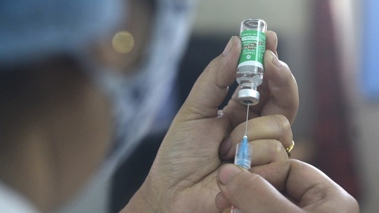 Mahipal Singh, a ward boy at the Moradabad district hospital, got the Covishield vaccine on Saturday, the first-day of India’s Covid-19 immunisation drive.(PTI) Mahipal Singh, a ward boy at the Moradabad district hospital, got the Covishield vaccine on Saturday, the first-day of India’s Covid-19 immunisation drive.(PTI)