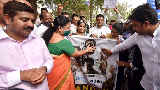 Bharatiya Janata Party leader Ram Kadam and supporters blackening the face of actors of Amazon Web Series Tandava's poster during a protest in Mumbai.(ANI Photo)