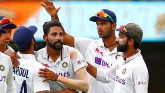 India's Mohammed Siraj s congratulated by teammates after taking his fifth wicket during play on day four of the fourth cricket Test between India and Australia at the Gabba, Brisbane(AP) India's Mohammed Siraj s congratulated by teammates after taking his fifth wicket during play on day four of the fourth cricket Test between India and Australia at the Gabba, Brisbane(AP)