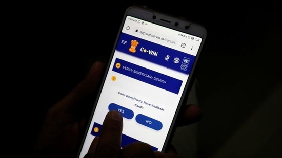A healthcare worker enters data into the Co-WIN app. (REUTERS) A healthcare worker enters data into the Co-WIN app. (REUTERS)