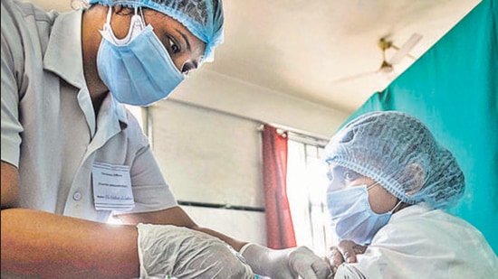 Out of the 1,802 beneficiaries who got vaccinated on Saturday, nine reported minor adverse effects during inoculation programme. (Pratham Gokhale/HT Photo) Out of the 1,802 beneficiaries who got vaccinated on Saturday, nine reported minor adverse effects during inoculation programme. (Pratham Gokhale/HT Photo)