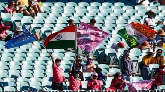 Indian supporters wave flags during play on day four of the third cricket test between India and Australia at the Sydney Cricket Ground, Sydney, Australia, Sunday, Jan. 10, 2021. (AP Photo/Rick Rycroft)(AP) Indian supporters wave flags during play on day four of the third cricket test between India and Australia at the Sydney Cricket Ground, Sydney, Australia, Sunday, Jan. 10, 2021. (AP Photo/Rick Rycroft)(AP)