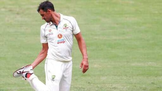 Australian bowler Mitchell Starc checks his boot during play on day three of the fourth cricket Test between India and Australia at the Gabba, Brisbane(AP) Australian bowler Mitchell Starc checks his boot during play on day three of the fourth cricket Test between India and Australia at the Gabba, Brisbane(AP)