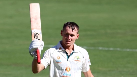 Australia's batsman Marnus Labuschagne celebrates reaching his century (100 runs) on day one of the fourth cricket Test match between Australia and India at The Gabba in Brisbane on January 15, 2021. (Photo by Patrick HAMILTON / AFP) / --IMAGE RESTRICTED TO EDITORIAL USE - STRICTLY NO COMMERCIAL USE-- (AFP)