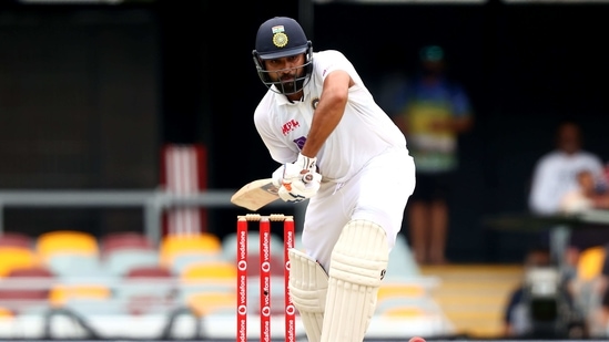 India's batsman Rohit Sharma plays a shot on day two of the fourth cricket Test match between Australia and India at The Gabba in Brisbane on January 16, 2021. (Photo by Patrick HAMILTON / AFP) / --IMAGE RESTRICTED TO EDITORIAL USE - STRICTLY NO COMMERCIAL USE--(AFP)