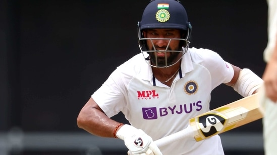 India's batsman Cheteshwar Pujara runs between the wickets on day three of the fourth cricket Test match between Australia and India at the Gabba in Brisbane on January 17, 2021. (Photo by Patrick HAMILTON / AFP) / --IMAGE RESTRICTED TO EDITORIAL USE - STRICTLY NO COMMERCIAL USE-- (AFP) India's batsman Cheteshwar Pujara runs between the wickets on day three of the fourth cricket Test match between Australia and India at the Gabba in Brisbane on January 17, 2021. (Photo by Patrick HAMILTON / AFP) / --IMAGE RESTRICTED TO EDITORIAL USE - STRICTLY NO COMMERCIAL USE-- (AFP)
