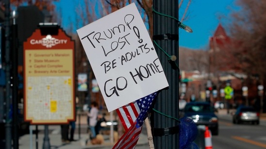 A sign left by an anti-protestor is shown near the Nevada State Legislature.(AFP) A sign left by an anti-protestor is shown near the Nevada State Legislature.(AFP)