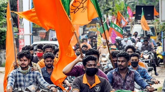 BJP supporters during a rally.(PTI) BJP supporters during a rally.(PTI)