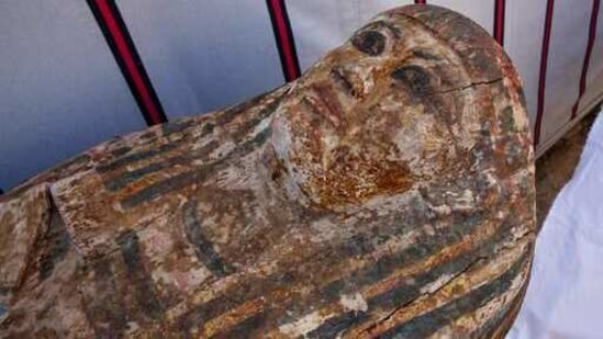 An ancient coffin is on display that Egyptian archaeologist Zahi Hawass and his team unearthed in a vast necropolis filled with burial shafts, coffins and mummies dating back to the New Kingdom 3000 BC, Monday, Jan. 17, 2021, in Saqqara, south of Cairo, Egypt. (AP) An ancient coffin is on display that Egyptian archaeologist Zahi Hawass and his team unearthed in a vast necropolis filled with burial shafts, coffins and mummies dating back to the New Kingdom 3000 BC, Monday, Jan. 17, 2021, in Saqqara, south of Cairo, Egypt. (AP)