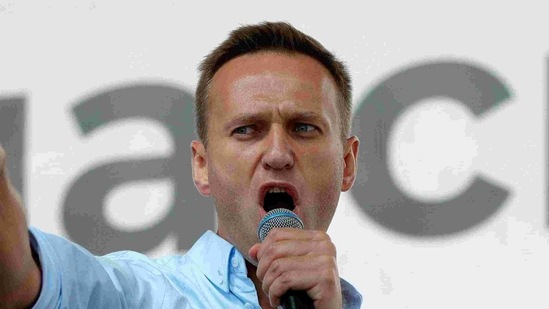 Russian opposition activist Alexei Navalny gestures while speaking to a crowd during a political protest in Moscow, Russia. (AP) Russian opposition activist Alexei Navalny gestures while speaking to a crowd during a political protest in Moscow, Russia. (AP)