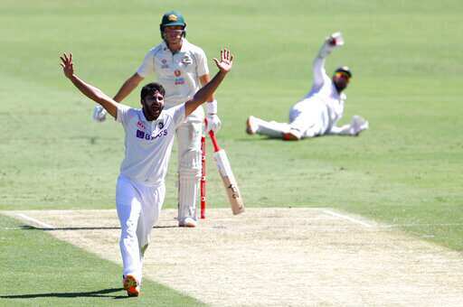 India's Shardul Thakur, left, appeals unsuccessfully for the wicket of Australia's Marnus Labuschagne during play on the first day of the fourth cricket test between India and Australia at the Gabba, Brisbane, Australia, Friday, Jan. 15, 2021. (AP Photo/Tertius Pickard) India's Shardul Thakur, left, appeals unsuccessfully for the wicket of Australia's Marnus Labuschagne during play on the first day of the fourth cricket test between India and Australia at the Gabba, Brisbane, Australia, Friday, Jan. 15, 2021. (AP Photo/Tertius Pickard)