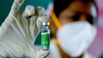A medical worker displays a Covishield vaccine vial at the government Rajaji hospital in Madurai on January 16. The inoculation campaign across the world’s second-most populous country will showcase whether Covid-19 can be swiftly tamed in nations with disjointed health and transportation networks.( Arun Sankar / AFP) A medical worker displays a Covishield vaccine vial at the government Rajaji hospital in Madurai on January 16. The inoculation campaign across the world’s second-most populous country will showcase whether Covid-19 can be swiftly tamed in nations with disjointed health and transportation networks.( Arun Sankar / AFP)