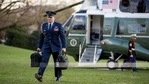 A US military aide carries the "president's emergency satchel," also know as "the football," with the nuclear launch codes.(AP) A US military aide carries the "president's emergency satchel," also know as "the football," with the nuclear launch codes.(AP)