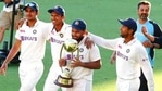 India's Rishabh Pant carries the trophy as he celebrates with his teammates after defeating Australia by three wickets on the final day of the fourth cricket test at the Gabba, Brisbane, Australia.(AP) India's Rishabh Pant carries the trophy as he celebrates with his teammates after defeating Australia by three wickets on the final day of the fourth cricket test at the Gabba, Brisbane, Australia.(AP)