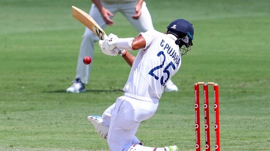 India's Cheteshwar Pujara reacts as he is hit on the helmet as he bats during play on the final day of the fourth cricket test between India and Australia at the Gabba, Brisbane.(AP) India's Cheteshwar Pujara reacts as he is hit on the helmet as he bats during play on the final day of the fourth cricket test between India and Australia at the Gabba, Brisbane.(AP)