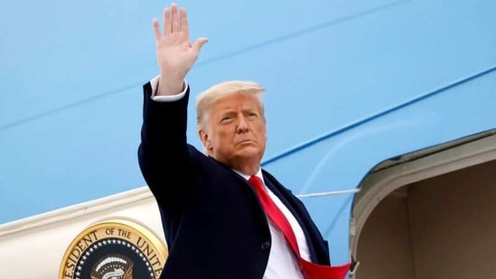 U.S. President Donald Trump salutes as he boards Air Force One at Valley International Airport after visiting the U.S.-Mexico border wall, in Harlingen, Texas, U.S., January 12, 2021. REUTERS/Carlos Barria(REUTERS)