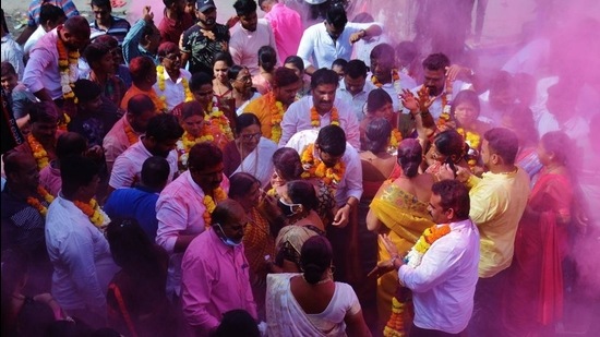 People celebrate the gram panchayat election results in Mankoli village, Thane, near Mumbai. (Praful Gangurde/HT Photo) People celebrate the gram panchayat election results in Mankoli village, Thane, near Mumbai. (Praful Gangurde/HT Photo)