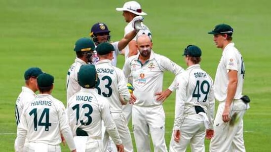 Australia's Nathan Lyon, centre, reacts as his video review is rejected during play on the final day of the fourth cricket test between India and Australia at the Gabba, Brisbane, Australia, Tuesday, Jan. 19, 2021. (AP Photo/Tertius Pickard)(AP) Australia's Nathan Lyon, centre, reacts as his video review is rejected during play on the final day of the fourth cricket test between India and Australia at the Gabba, Brisbane, Australia, Tuesday, Jan. 19, 2021. (AP Photo/Tertius Pickard)(AP)