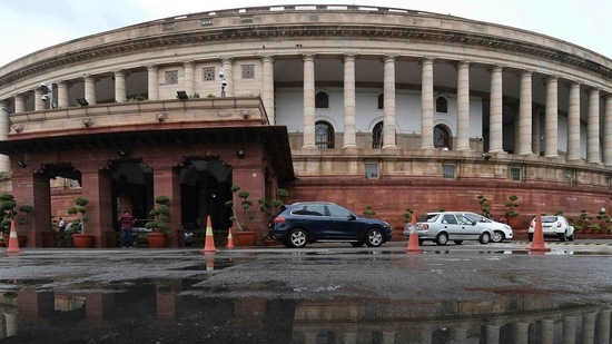 The Parliament building reflected in a puddle after heavy rain during the monsoon session of the Indian Parliament in New Delhi.(AP) The Parliament building reflected in a puddle after heavy rain during the monsoon session of the Indian Parliament in New Delhi.(AP)
