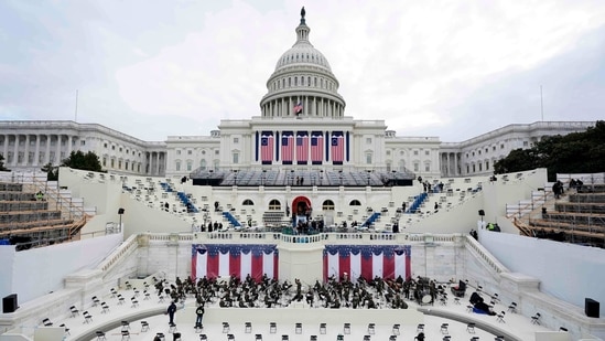 Preparations are made prior to a dress rehearsal for the 59th inaugural ceremony for President-elect Joe Biden and Vice President-elect Kamala Harris at the US Capitol on January 18 in Washington, DC. Joe Biden ascends to the presidency on January 20.(Patrick Semansky / POOL / AFP)