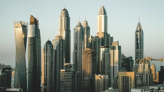 With its cavernous malls, frenetic construction and legions of foreign workers, Dubai was built on the promise of globalization, drawing largely from the aviation, hospitality and retail sectors — all hard hit by the virus.(Unsplash) With its cavernous malls, frenetic construction and legions of foreign workers, Dubai was built on the promise of globalization, drawing largely from the aviation, hospitality and retail sectors — all hard hit by the virus.(Unsplash)