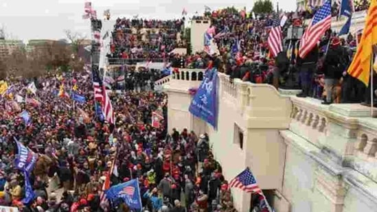 Supporters of US President Donald Trump gather in front of the US Capitol Building in Washington.(Reuters Photo ) Supporters of US President Donald Trump gather in front of the US Capitol Building in Washington.(Reuters Photo )