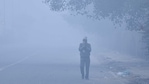 A man in winter wear jogs on a foggy morning at Pusa Road in New Delhi on January 19. According to the India Meteorological Department (IMD), Delhi's minimum temperature settled at 7.8 degrees Celsius, a notch above normal, on January 20. A man in winter wear jogs on a foggy morning at Pusa Road in New Delhi on January 19. According to the India Meteorological Department (IMD), Delhi's minimum temperature settled at 7.8 degrees Celsius, a notch above normal, on January 20.