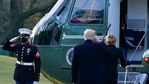 President Donald Trump salutes as he boards Marine One with First Lady Melania Trump on the South Lawn of the White House in Washington.(AP) President Donald Trump salutes as he boards Marine One with First Lady Melania Trump on the South Lawn of the White House in Washington.(AP)
