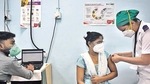 A healthcare worker being administered the vaccine shot at Rajawadi Hospital, Ghatkopar, on Monday. (Satish Bate/HT Photo)(HT_PRINT) A healthcare worker being administered the vaccine shot at Rajawadi Hospital, Ghatkopar, on Monday. (Satish Bate/HT Photo)(HT_PRINT)
