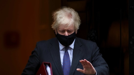 Britain's Prime Minister Boris Johnson leaves Downing Street in London, Britain, January 20, 2021.(REUTERS)