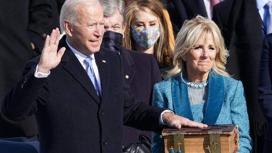 Joe Biden is sworn in as the 46th President of the United States as his wife Jill Biden holds a bible on the West Front of the U.S. Capitol in Washington, U.S., January 20, 2021. REUTERS/Kevin Lamarque(REUTERS)