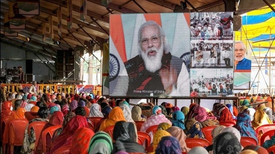 Farmers watch the live telecast of Prime Minister Narendra Modi's speech during 'Kisan Mahasammelan', in Raisen on December 18, 2020. (File photo) Farmers watch the live telecast of Prime Minister Narendra Modi's speech during 'Kisan Mahasammelan', in Raisen on December 18, 2020. (File photo)