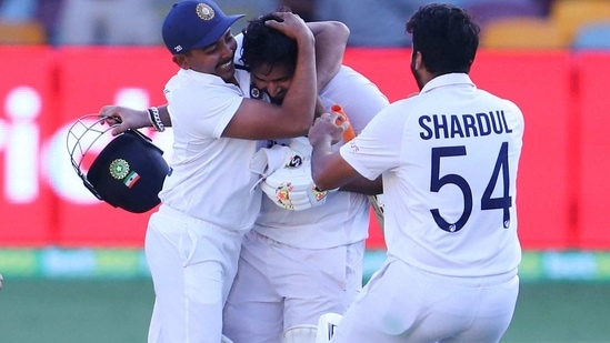 India's Rishabh Pant, centre, is congratulated by teammates.(AP)