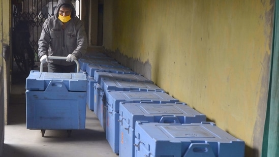 Tezpur: A worker arranges boxes containing Covishield vaccine doses for their dispatch across the Sonitpur district, in Tezpur, Friday, Jan. 15, 2021. A countrywide COVID-19 vaccination drive is set to rollout from January 16, 2021. (PTI Photo) (PTI01_15_2021_000220B)(PTI) Tezpur: A worker arranges boxes containing Covishield vaccine doses for their dispatch across the Sonitpur district, in Tezpur, Friday, Jan. 15, 2021. A countrywide COVID-19 vaccination drive is set to rollout from January 16, 2021. (PTI Photo) (PTI01_15_2021_000220B)(PTI)