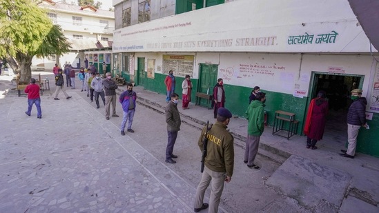 Shimla: Residents maintain social distancing as they wait to cast their votes during the second phase of Himachal Pradesh panchayat polls, at Ghannati in Shimla, Tuesday, Jan. 19, 2021. (PTI Photo)�(PTI01_19_2021_000055B)(PTI) Shimla: Residents maintain social distancing as they wait to cast their votes during the second phase of Himachal Pradesh panchayat polls, at Ghannati in Shimla, Tuesday, Jan. 19, 2021. (PTI Photo)�(PTI01_19_2021_000055B)(PTI)