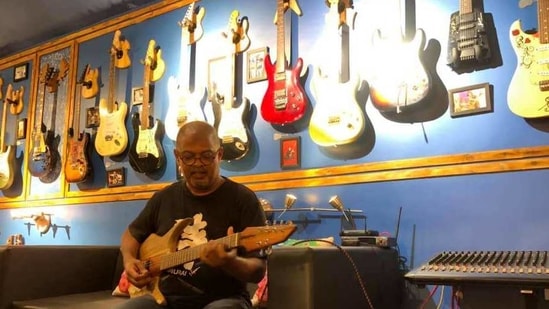 Sebastian Almeida with his new collection of guitars. (HT PHOTO) Sebastian Almeida with his new collection of guitars. (HT PHOTO)
