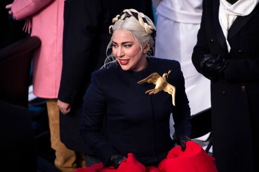 Lady Gaga returns from the podium after signing the National Anthem during the 59th Presidential Inauguration at the US Capitol for President-elect Joe Biden in Washington. (AP)
