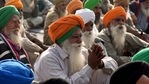 Farmers sitting during an ongoing protest against the new farm laws, at Singhu border in New Delhi. (ANI Photo) Farmers sitting during an ongoing protest against the new farm laws, at Singhu border in New Delhi. (ANI Photo)