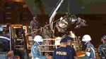 Indonesian soldier move debris found in the water around the location where the Sriwijaya Air passenger jet crashed at the search and rescue command center at Tanjung Priok Port in Jakarta, Indonesia, Friday, Jan 15, 2021. More searchers and rescuers joined the search Friday for wreckage and victims from an Indonesian plane that crashed last weekend in the Java Sea. (AP Photo/Achmad Ibrahim)(AP) Indonesian soldier move debris found in the water around the location where the Sriwijaya Air passenger jet crashed at the search and rescue command center at Tanjung Priok Port in Jakarta, Indonesia, Friday, Jan 15, 2021. More searchers and rescuers joined the search Friday for wreckage and victims from an Indonesian plane that crashed last weekend in the Java Sea. (AP Photo/Achmad Ibrahim)(AP)