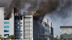 Smoke billows out after a massive fire broke out at the Serum Institute of India, in Pune, Thursday.(PTI) Smoke billows out after a massive fire broke out at the Serum Institute of India, in Pune, Thursday.(PTI)