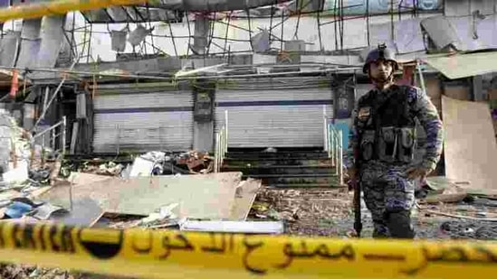 An Iraqi policeman stands guard at the site of a car bomb attack in Baghdad.(Representative Image/Reuters File Photo) An Iraqi policeman stands guard at the site of a car bomb attack in Baghdad.(Representative Image/Reuters File Photo)