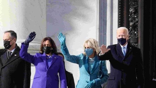 WASHINGTON, DC - JANUARY 20: US President Joe Biden and Vice President Kamala Harris with their respective spouses. Joe Raedle/Getty Images/AFP