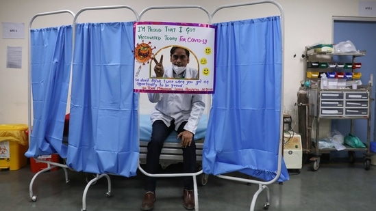A doctor poses after receiving a dose of the Bharat Biotech's COVAXIN, at a government-run hospital in New Delhi on January 19. Active cases now comprise just 1.86% of the total infections, according to the health ministry. It said that 72% of the active cases are concentrated in Kerala, Maharashtra, Uttar Pradesh, Karnataka, West Bengal. (Anushree Fadnavis / REUTERS)