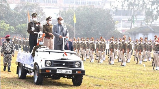 Manipur chief minister N Biren Singh accompanied by DGP Manipur LM Khaute inspecting the parade in Imphal on Thursday. (HT Photo) Manipur chief minister N Biren Singh accompanied by DGP Manipur LM Khaute inspecting the parade in Imphal on Thursday. (HT Photo)